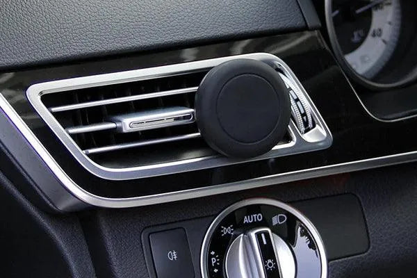 Suport telefon auto magnetic cu fixare in grila de ventilatie