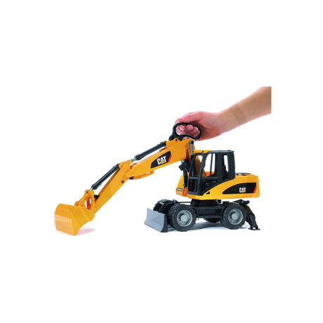 Macheta excavator pe roti Cat, scara 1:16 Bruder 02445 – imagine 4